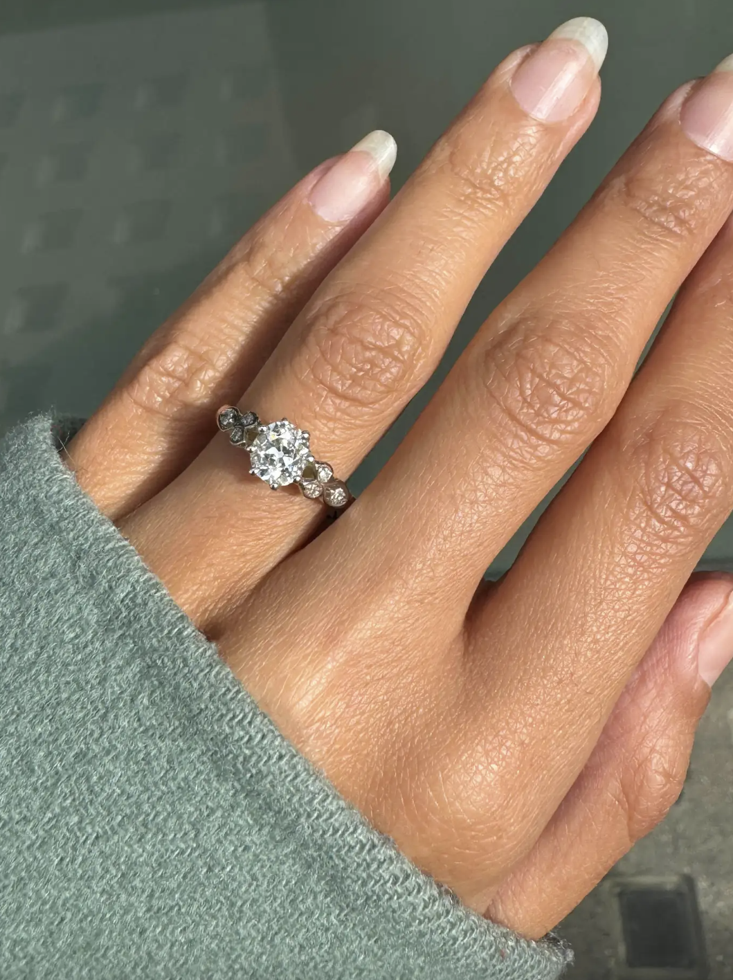 ladies hand with white gold and platinum ring