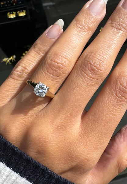 O.69 Carat Diamond and 18 Carat Yellow and White Gold Solitaire Engagement Ring