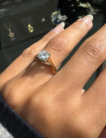 O.69 Carat Diamond and 18 Carat Yellow and White Gold Solitaire Engagement Ring