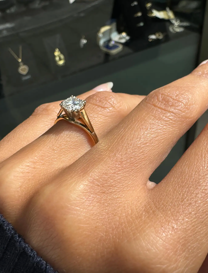 O.69 Carat Diamond and 18 Carat Yellow and White Gold Solitaire Engagement Ring