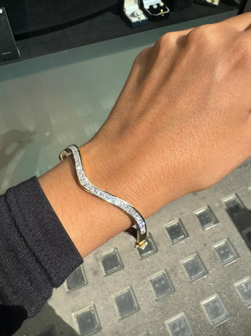 Princess Cut Diamond and 18 Carat Yellow Gold Thin Wave Bangle Bracelet