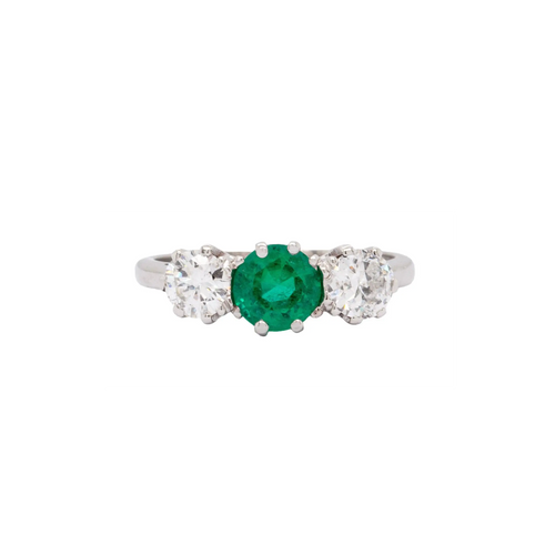Antique 0.95 Carat Emerald and Diamond Three Stone Platinum Ring