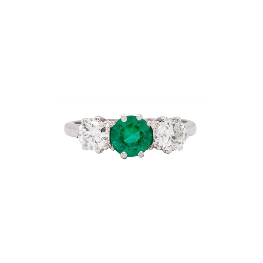 Antique 0.95 Carat Emerald and Diamond Three Stone Platinum Ring