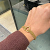 tiffany & co 18k gold multi chain  bracelet on person wrist