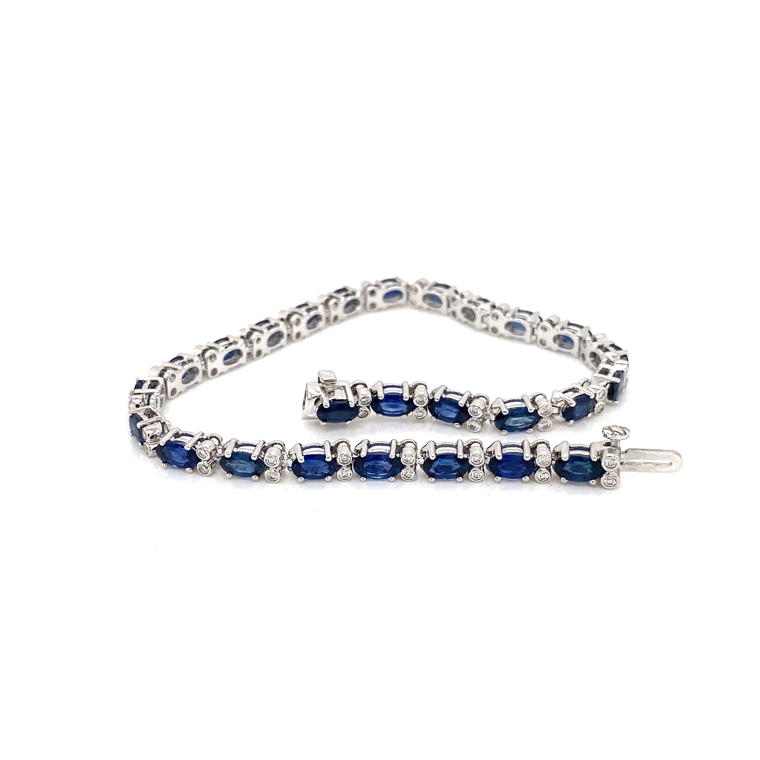 Oval Blue Sapphire and Diamond 18 Carat White Gold Tennis Bracelet