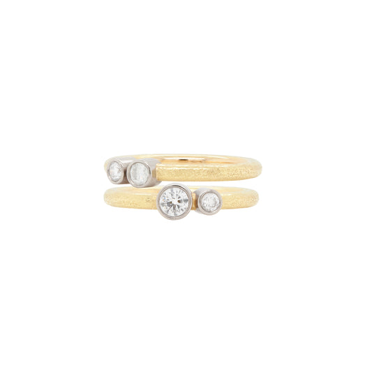 Pair of 18 Carat Yellow and White Gold Rub-Over Diamond Stacking Rings