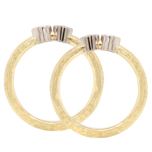 Pair of 18 Carat Yellow and White Gold Rub-Over Diamond Stacking Rings