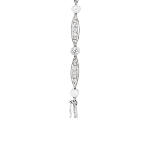 details of diamonds and pearls on a french vintage platinum bracelet