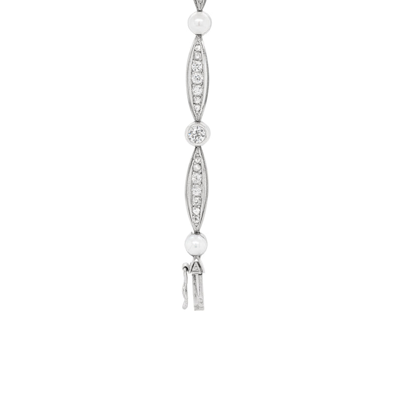 details of diamonds and pearls on a french vintage platinum bracelet