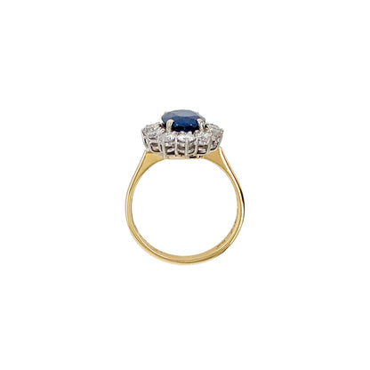 Blue Sapphire and Diamond Halo 18K White and Yellow Gold Cluster Engagement Ring