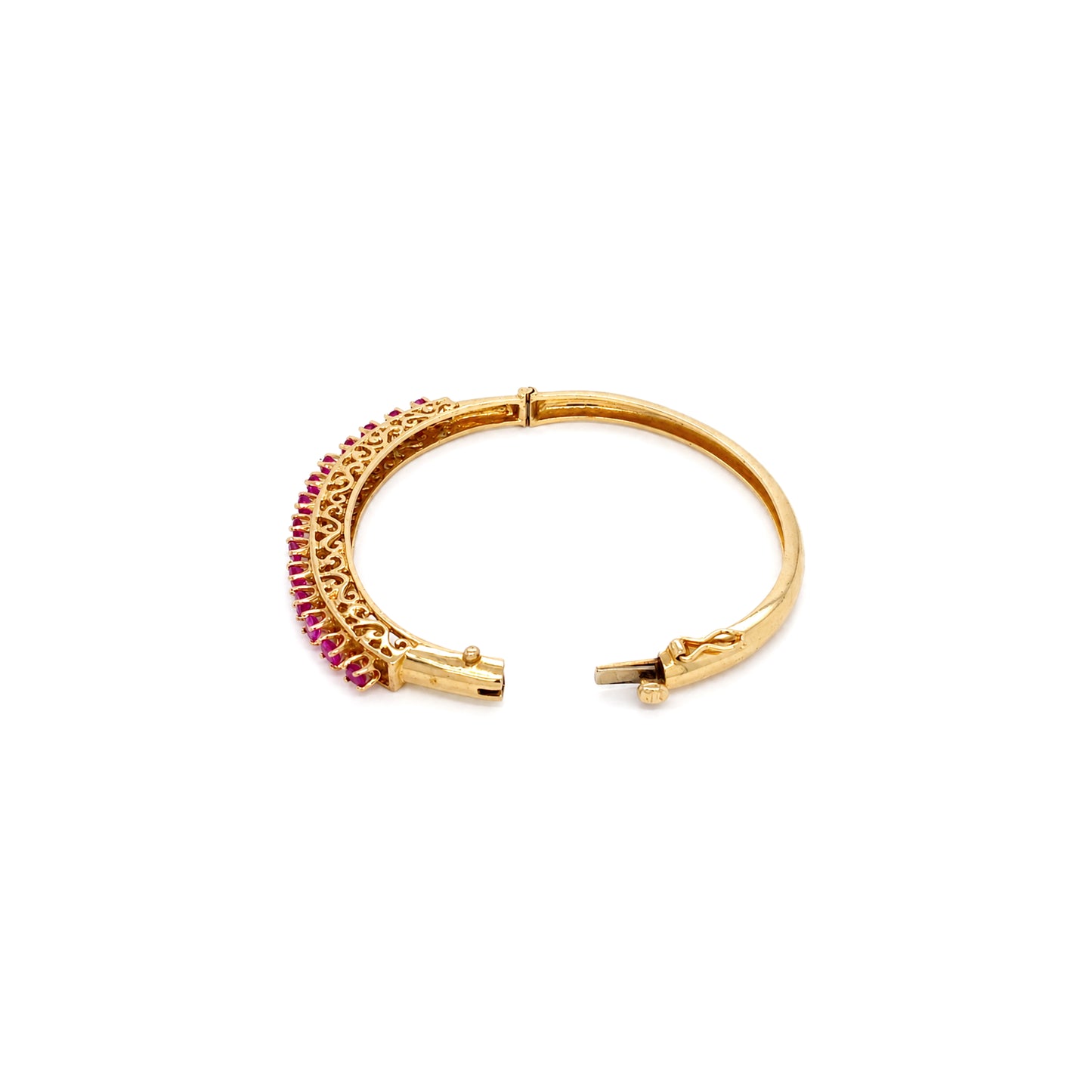 Vintage Ruby and 14 Carat Yellow Gold Open Work Hinged Bangle, circa 1980s