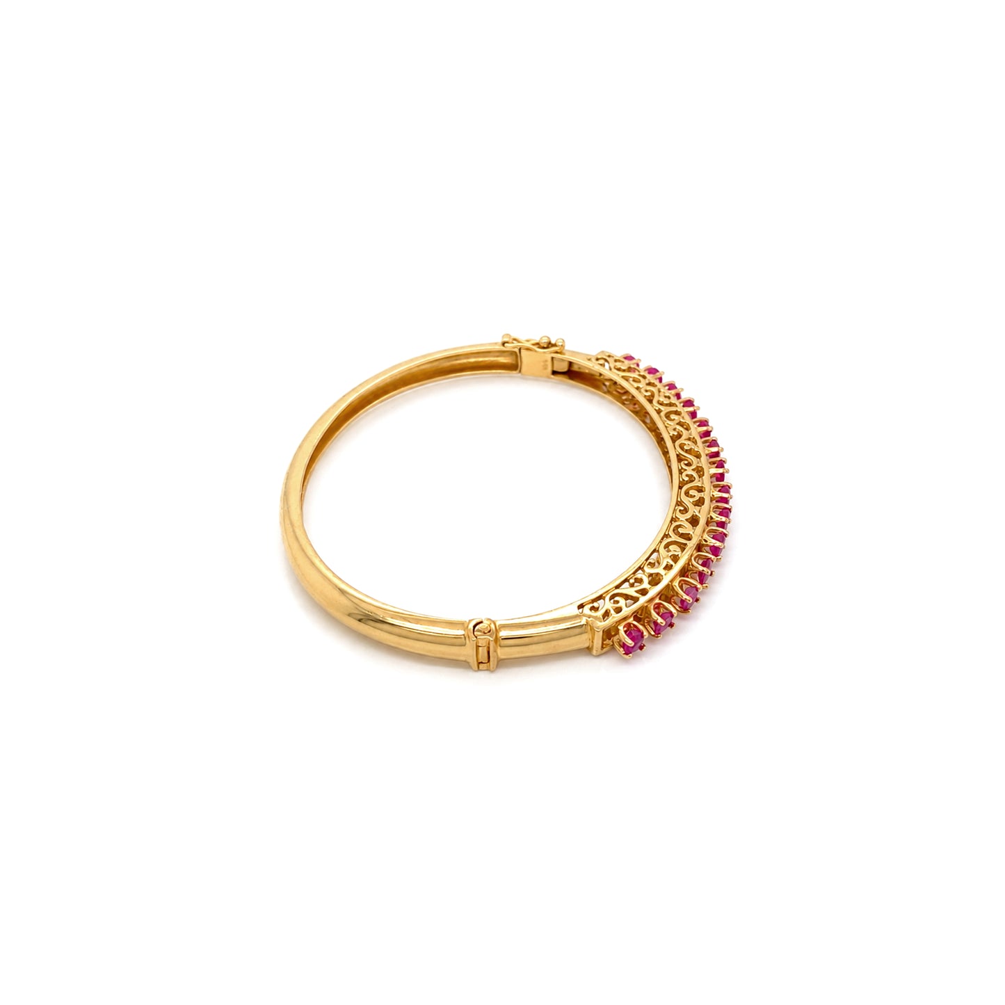 Vintage Ruby and 14 Carat Yellow Gold Open Work Hinged Bangle, circa 1980s