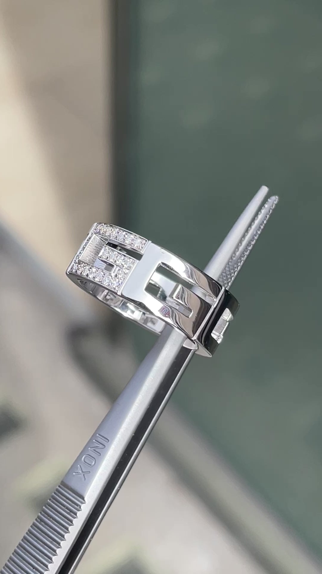 video of Gucci 18 Carat White Gold Open Work G Logo Diamond Band Ring