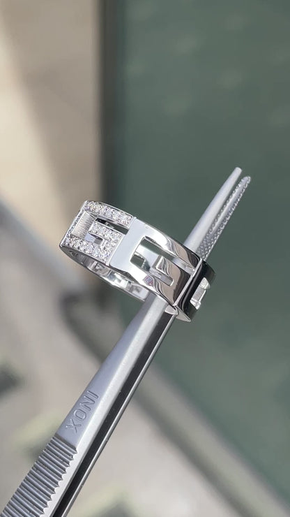 video of Gucci 18 Carat White Gold Open Work G Logo Diamond Band Ring