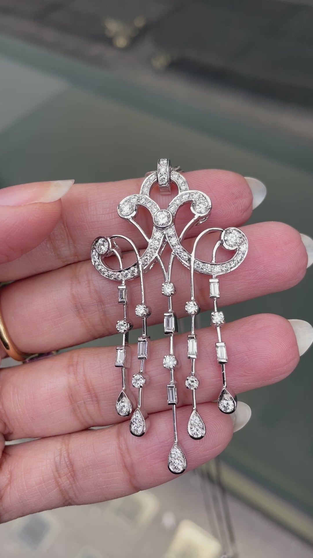 video of Baguette & Brilliant Cut Diamond 18 Carat White Gold Cascade Chandelier Pendant
