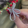 video of vintage diamond ribbon brooch 