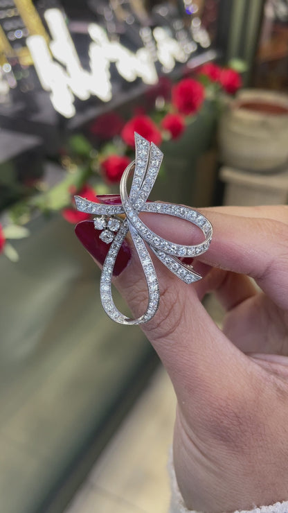 video of vintage diamond ribbon brooch 