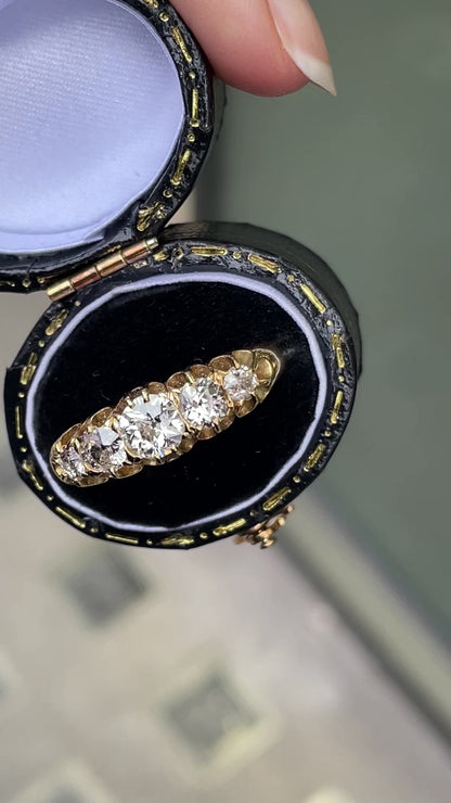 video of Antique Old Cut Diamond 18 Carat Yellow Gold Five Stone Ring in case