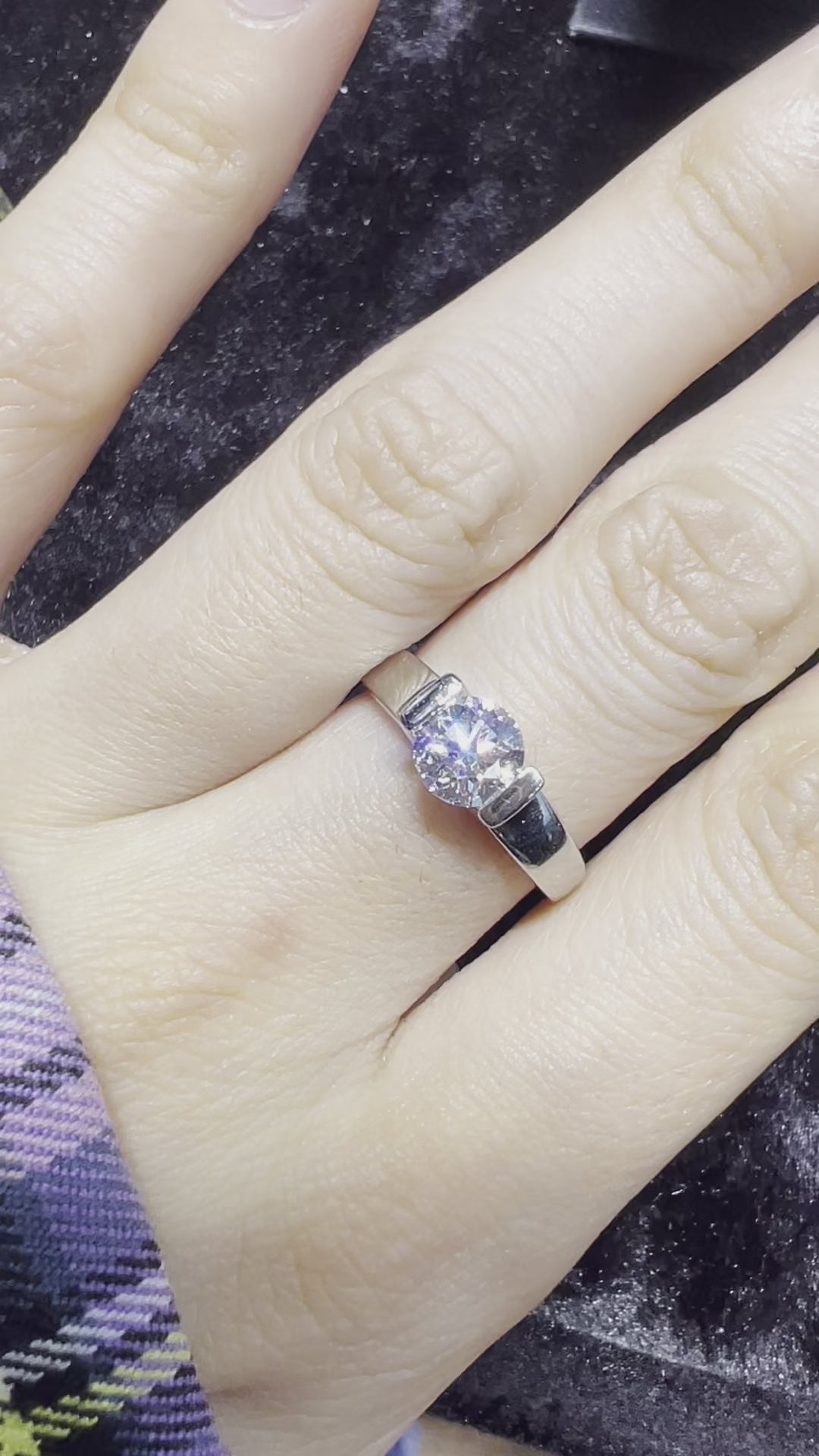 1.01ct E VS2 round brilliant cut diamond engagement ring in platinum with high semi rub-over setting and tapered polished band