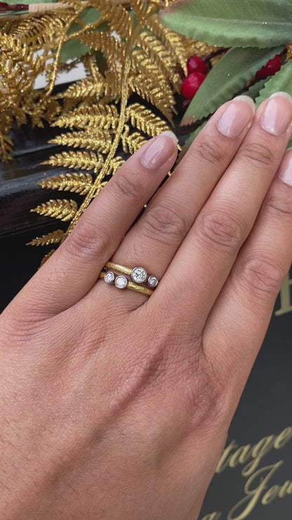 Pair of 18 Carat Yellow and White Gold Rub-Over Diamond Stacking Rings