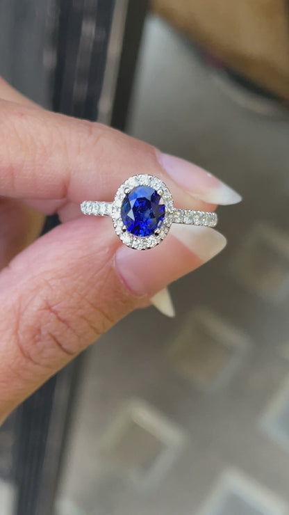 1.20ct Blue Sapphire and Diamond 18 Carat White Gold Halo Engagement Ring
