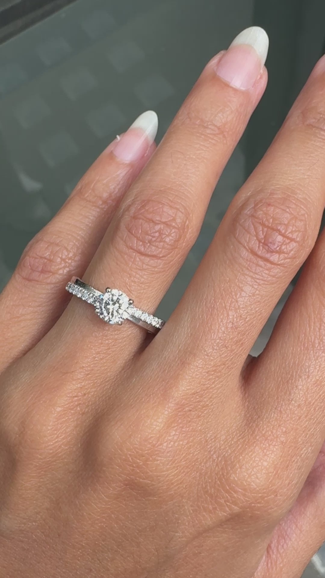 video of an  0.70ct D SI1 Round Brilliant Cut Diamond 18 Carat White Gold Engagement Ring