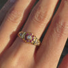 video of lady wearing Antique Ruby & Old Cut Diamond Flower Ring in 18K Yellow Gold