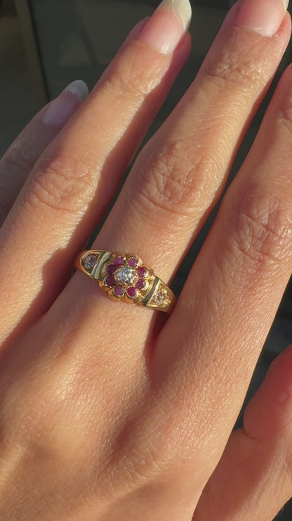video of lady wearing Antique Ruby & Old Cut Diamond Flower Ring in 18K Yellow Gold