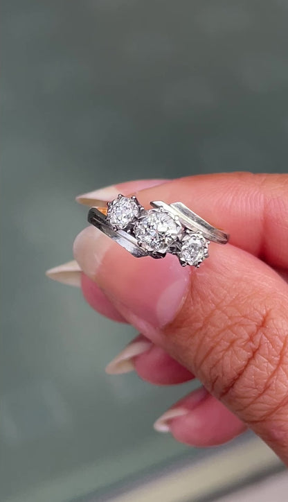 Old Cut Three-Stone Twist 18 Carat Gold and Platinum Ring, Circa 1920s